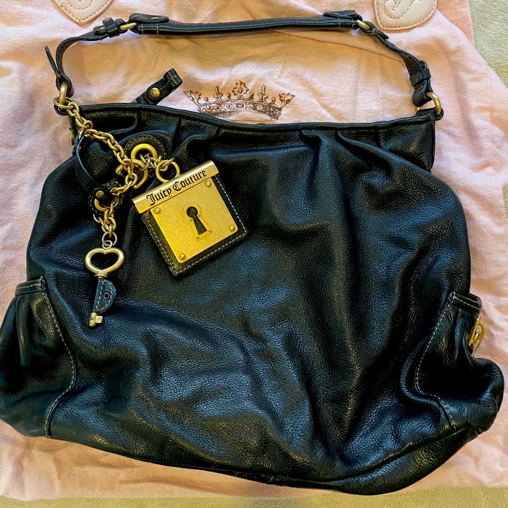 Black leather Juicy Couture shoulder bag with dust bag.